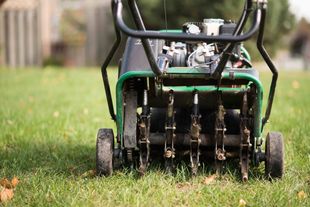 Aerator being operated by a Hometurf technician